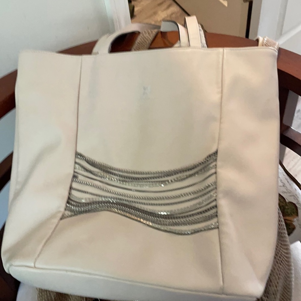 Light pink cool style with silver chains a winner